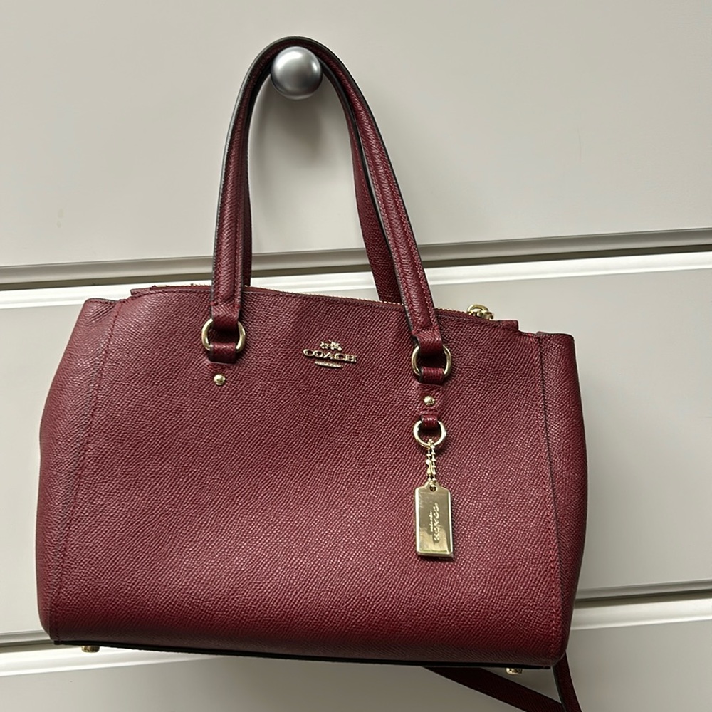 Burgundy coach pocketbook